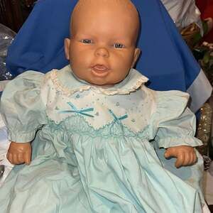 Vintage Famosa Spain Realistic Baby Doll in Blue Smocked Dress